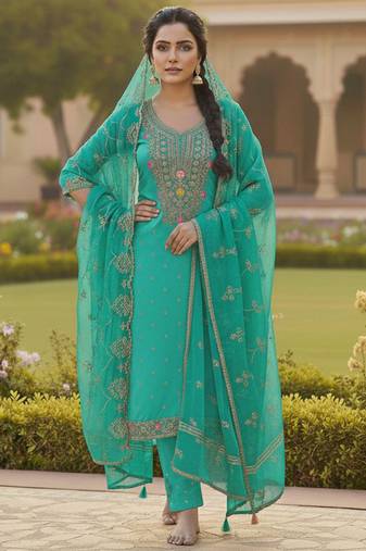 Sea green color chanderi butti fabric beautiful embroidered suit