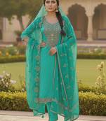 Sea green color chanderi butti fabric beautiful embroidered suit