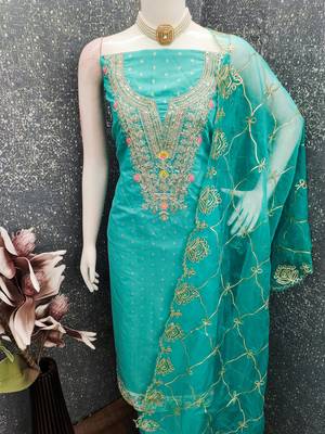 Sea green color chanderi butti fabric beautiful embroidered suit 4