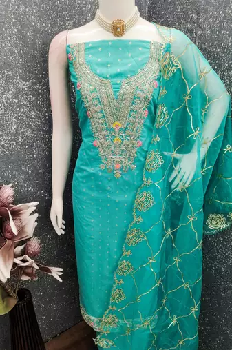 Sea green color chanderi butti fabric beautiful embroidered suit