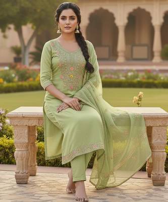 Green color chanderi butti fabric beautiful embroidered suit 2