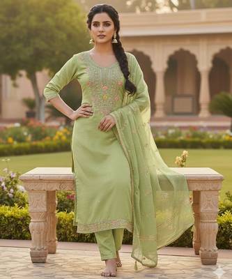 Green color chanderi butti fabric beautiful embroidered suit 3