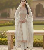 Off white color chanderi butti fabric beautiful embroidered suit