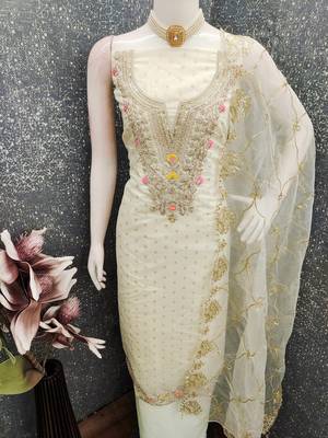 Off white color chanderi butti fabric beautiful embroidered suit 4
