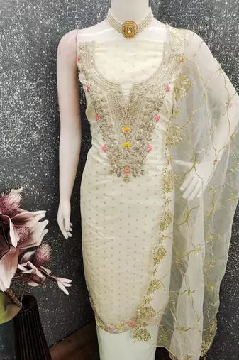 Off white color chanderi butti fabric beautiful embroidered suit