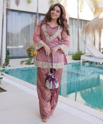 Pink color beautful embroidered punjabi suit with matching purse 1