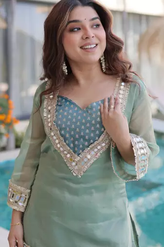Sky blue color beautful embroidered punjabi suit with matching purse