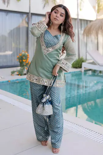 Sky blue color beautful embroidered punjabi suit with matching purse
