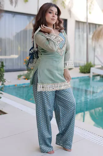Sky blue color beautful embroidered punjabi suit with matching purse