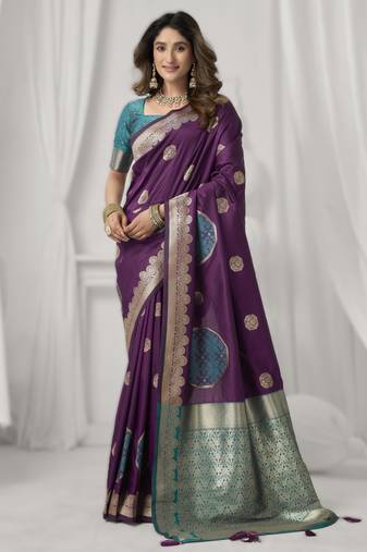 Purple soft silk saree with elegant fancy pom-pom pallu