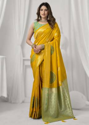 Yellow soft silk blend saree with elegant fancy pom-pom pallu 1