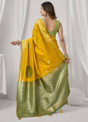 Yellow soft silk blend saree with elegant fancy pom-pom pallu 2