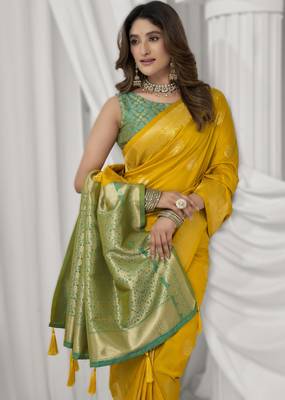 Yellow soft silk blend saree with elegant fancy pom-pom pallu 3