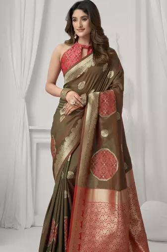 Brown soft silk saree with elegant fancy pom-pom pallu