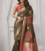 Brown soft silk saree with elegant fancy pom-pom pallu
