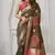 Brown soft silk saree with elegant fancy pom-pom pallu