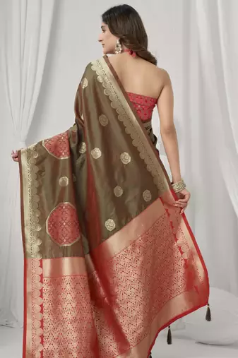 Brown soft silk blend saree with elegant fancy pom-pom pallu
