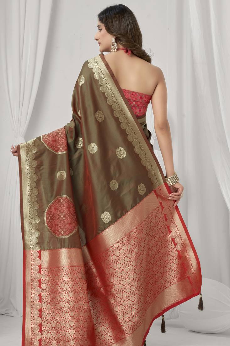 Brown soft silk saree with elegant fancy pom-pom pallu