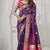 Magenta soft silk saree with elegant fancy pom-pom pallu