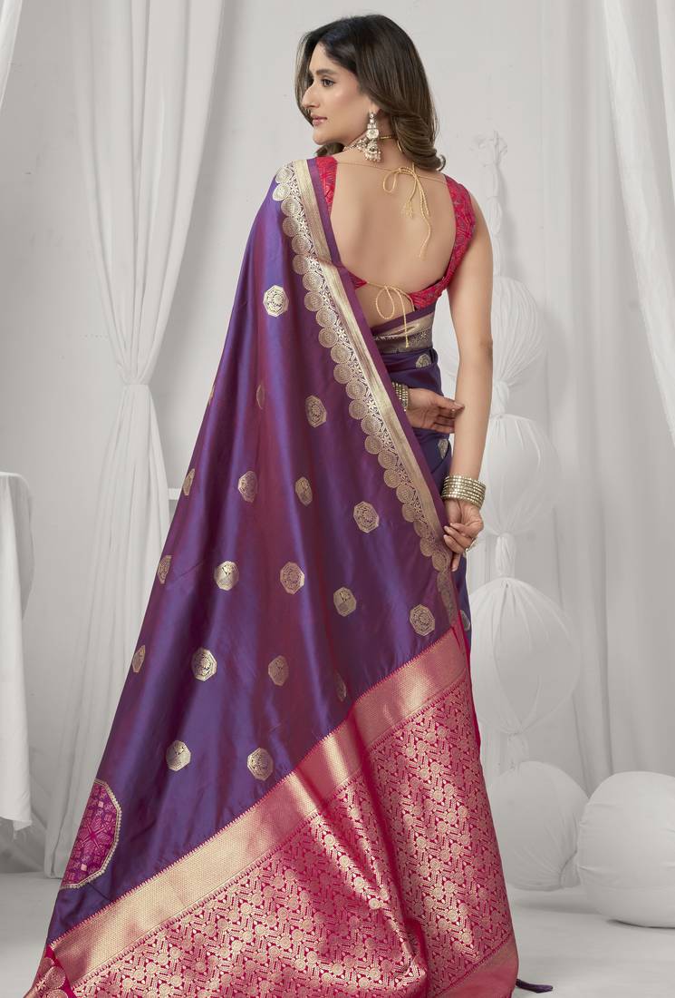 Magenta soft silk saree with elegant fancy pom-pom pallu
