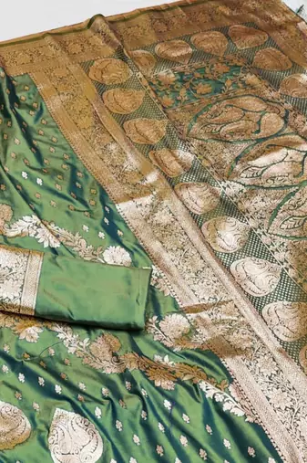 green zari woven silk blend saree with rich zari
