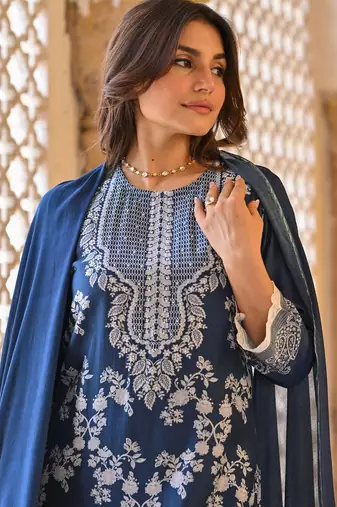 Teal color beautiful readymade dress on muslin for graceful looks
