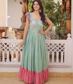 Green color beautiful girlie readymade gown for graceful girlie looks