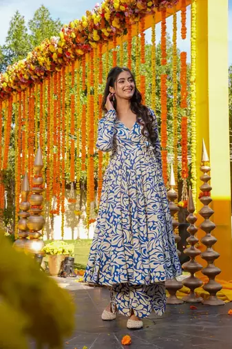 Blue color partywear anarkali style top with bottom for graceful looks