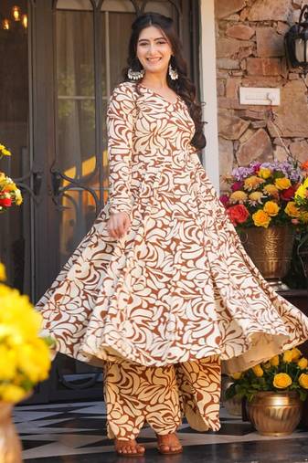 Mustard color designer partywear anarkali style top with bottom for graceful looks