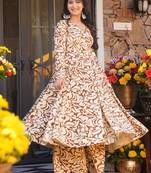 Mustard color designer partywear anarkali style top with bottom for graceful looks