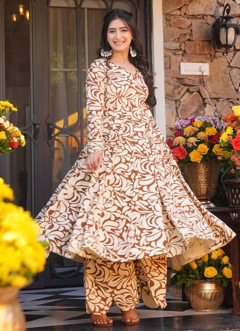 Mustard color designer partywear anarkali style top with bottom for graceful looks