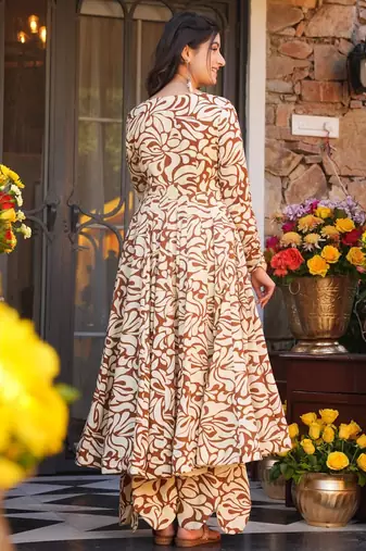 Mustard color partywear anarkali style top with bottom for graceful looks