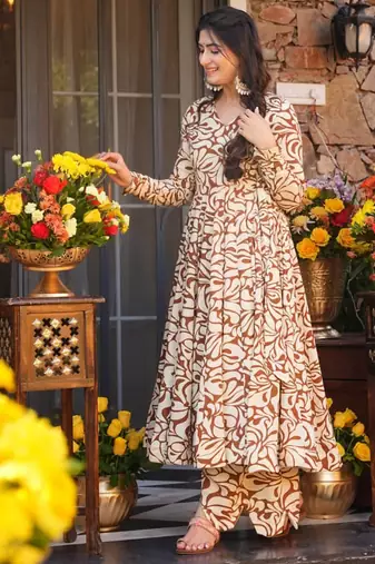 Mustard color partywear anarkali style top with bottom for graceful looks