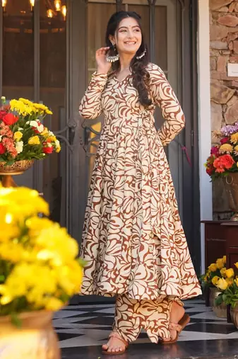Mustard color partywear anarkali style top with bottom for graceful looks