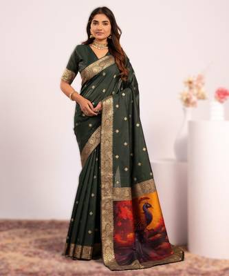 Green extraordinary banarasi silk blend saree with resham peacock pallu 1