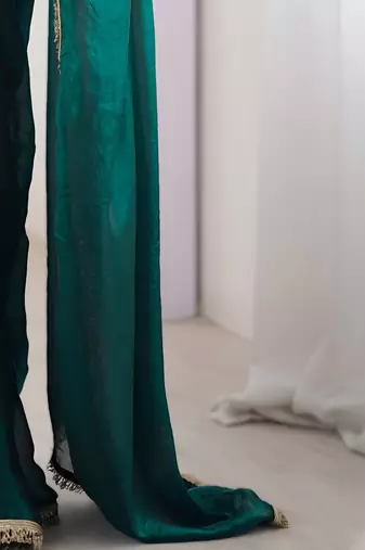 Green soft space silk blend saree with sequin zalar lace border & matching blouse