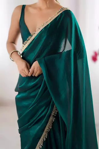 Green soft space silk blend saree with sequin zalar lace border & matching blouse