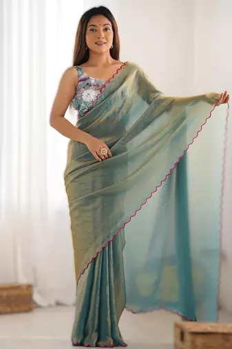 green most demanded pure space silk saree with scalloped border & designer beaded blouse