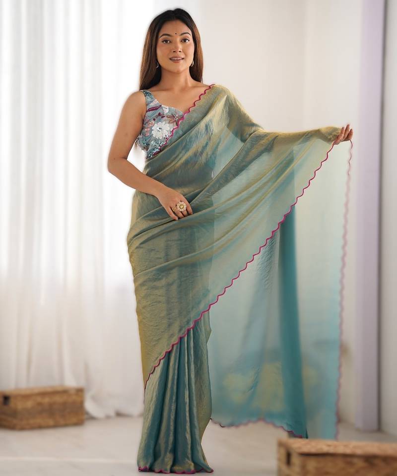green most demanded pure space silk saree with scalloped border & designer beaded blouse