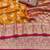 orange banarasi silk blend kanjivaram zari woven saree with rich border