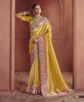 Yellow luxurious pure smooth zari silk blend saree with detailed thread work and sequins 1