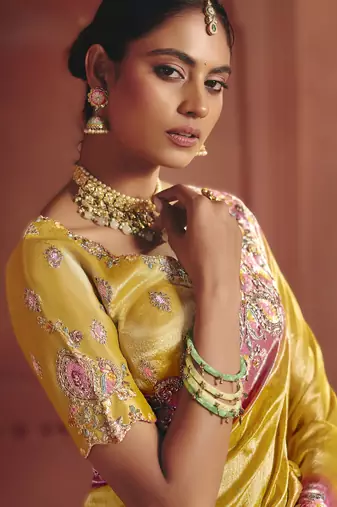 Yellow luxurious pure smooth zari silk blend saree with detailed thread work and sequins