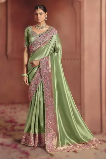 Parrot green traditional pure smooth zari silk saree with heavy embroidery and sequins