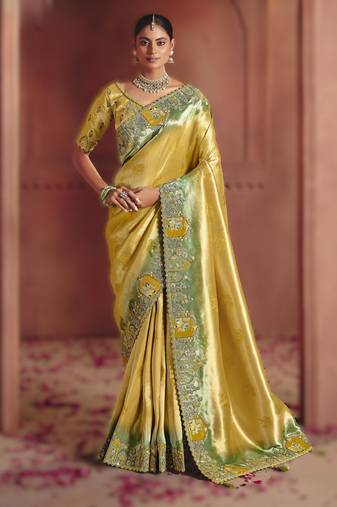 Golden exquisite pure smooth zari silk saree with sequins and heavy embroidery
