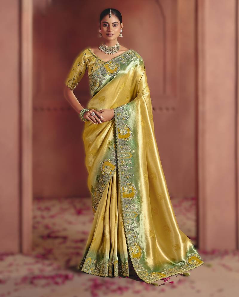 Golden exquisite pure smooth zari silk saree with sequins and heavy embroidery