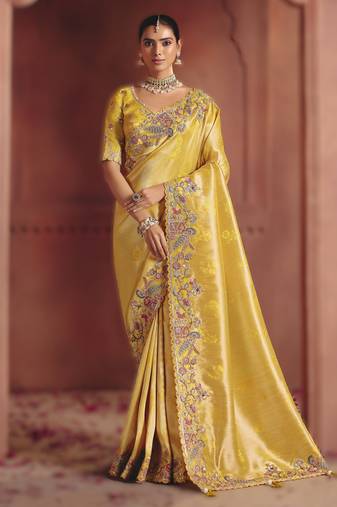Light yellow majestic pure smooth zari silk saree with sequins and heavy embroidery
