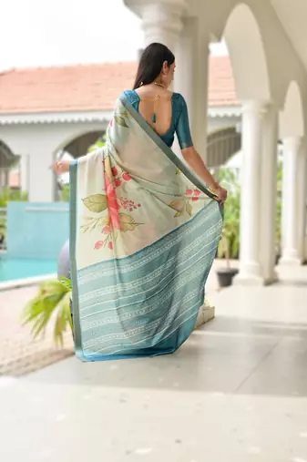sky_blue soft pure satin silk blend saree with hand painted floral design & zari border