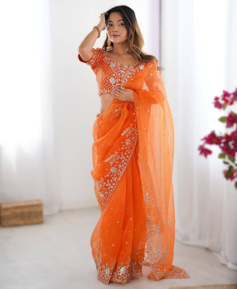 Orange heavy organza silk saree with thread & sequin embroidery