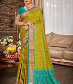green color ethnic patola silk blend fabric beautiful festive saree