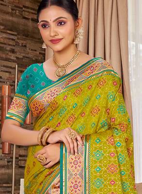 green ethnic patola silk blend festive saree 2